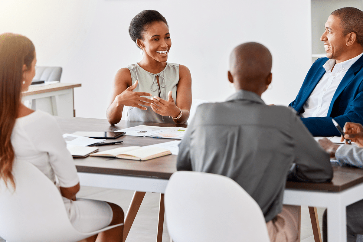 executives discussing around table